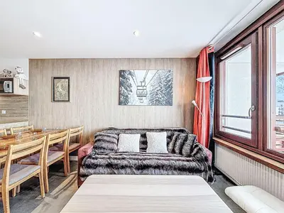 Coin salon dans l'établissement Apartment Le Curling B - Val Claret-45 by Interhome