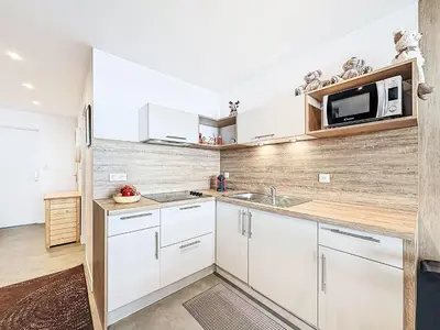 Cuisine ou kitchenette dans l'établissement Apartment Le Curling B - Val Claret-45 by Interhome