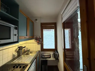 Cuisine ou kitchenette dans l'établissement Résidence Les Chalets des Arolles - maeva Home - Studio au pied des pistes vue montagne 4 personnes - Sélection MAE-6103