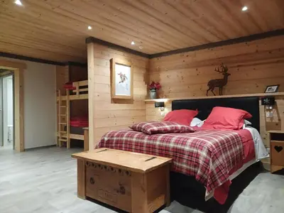 Un ou plusieurs lits dans un hébergement de l'établissement Chalet La Dolce Vita en Savoie