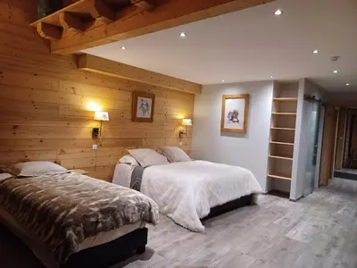 Un ou plusieurs lits dans un hébergement de l'établissement Chalet La Dolce Vita en Savoie