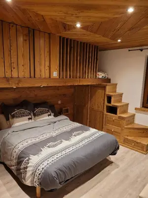 Un ou plusieurs lits dans un hébergement de l'établissement Chalet de Pramariaz