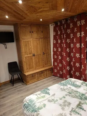 Un ou plusieurs lits dans un hébergement de l'établissement Chalet de Pramariaz