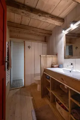 Cuisine ou kitchenette dans l'établissement Chalet Mémé dans les Orties