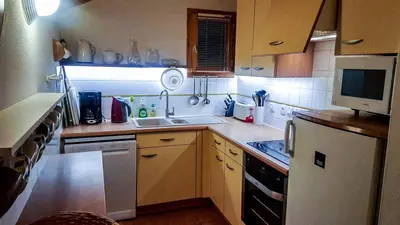 Cuisine ou kitchenette dans l'établissement Beaumont