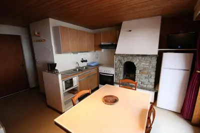 Cuisine ou kitchenette dans l'établissement le petit coin montagne 4