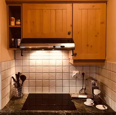Cuisine ou kitchenette dans l'établissement Sunny 1 Bed Apartment - Arc 1950 - Manoir Savoie