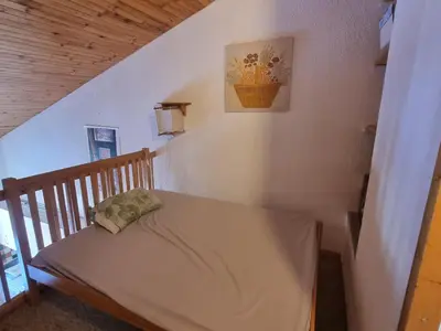 Un ou plusieurs lits dans un hébergement de l'établissement Appartement en duplex - 6 pers. - FR-1-181-2878