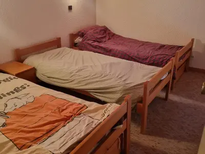 Un ou plusieurs lits dans un hébergement de l'établissement Appartement en duplex - 6 pers. - FR-1-181-2878