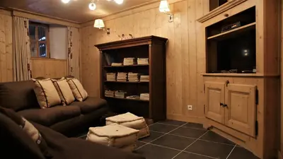 Coin salon dans l'établissement Chalet Geneviève