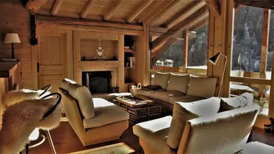 Coin salon dans l'établissement Chalet Geneviève
