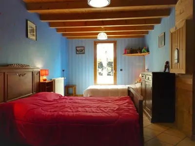 Un ou plusieurs lits dans un hébergement de l'établissement Chalet Analma
