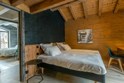Un ou plusieurs lits dans un hébergement de l'établissement Maisons de montagne Le Samovar