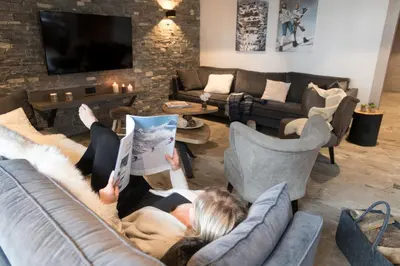 Coin salon dans l'établissement Chalet Skadi - Village Montana