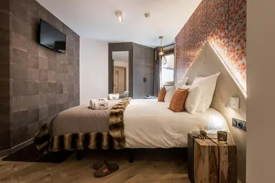 Un ou plusieurs lits dans un hébergement de l'établissement Chalet Skadi - Village Montana