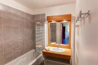 Salle de bains dans l'établissement Résidence Plein Soleil