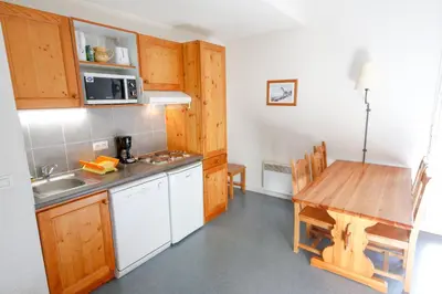 Cuisine ou kitchenette dans l'établissement Résidence Plein Soleil