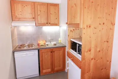 Cuisine ou kitchenette dans l'établissement Résidence Plein Soleil