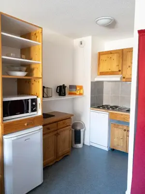 Cuisine ou kitchenette dans l'établissement Résidence Plein Soleil