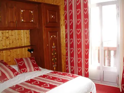 Un ou plusieurs lits dans un hébergement de l'établissement Hôtel Le Grand-Bec