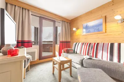 Coin salon dans l'établissement Résidence Pierre & Vacances Les Balcons De Bellevarde