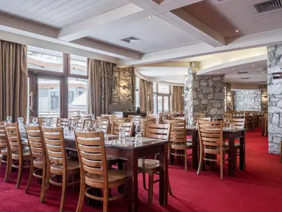 Restaurant ou autre lieu de restauration dans l'établissement Hôtel Tignes Le Diva