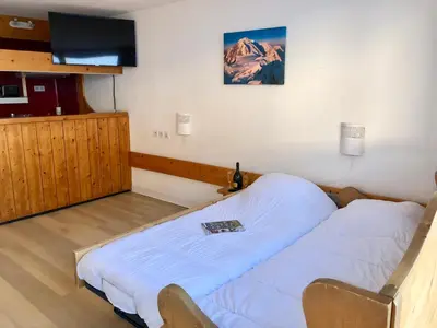 Un ou plusieurs lits dans un hébergement de l'établissement Arcadien - Appartement les Arcs 1800 - 10 personnes - 3 chambres