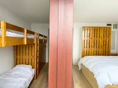 Un ou plusieurs lits dans un hébergement de l'établissement Arcadien - Appartement les Arcs 1800 - 10 personnes - 3 chambres