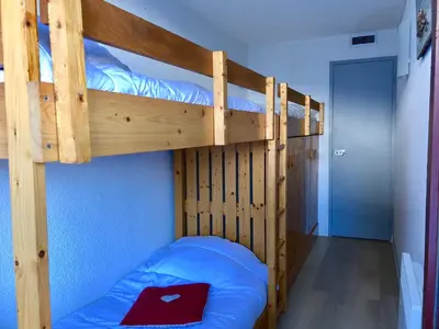 Un ou plusieurs lits dans un hébergement de l'établissement Arcadien - Appartement les Arcs 1800 - 10 personnes - 3 chambres