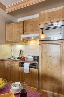Cuisine ou kitchenette dans l'établissement Residence Arc 1950 Le Village - maeva Home