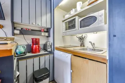 Cuisine ou kitchenette dans l'établissement Résidences quartier Charmettoger - maeva Home