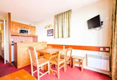 Cuisine ou kitchenette dans l'établissement Résidences quartier Charmettoger - maeva Home