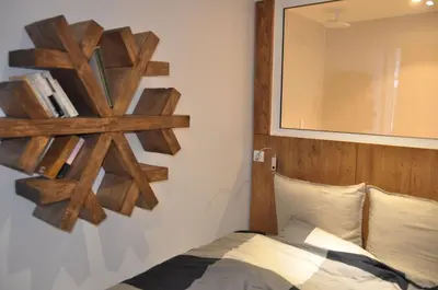 Un ou plusieurs lits dans un hébergement de l'établissement Les Cîmes - Cosy apartment