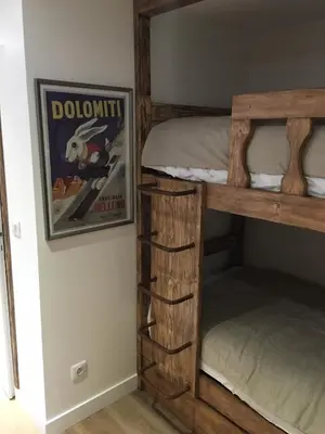 Un ou plusieurs lits dans un hébergement de l'établissement Les Cîmes - Cosy apartment