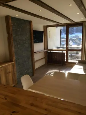 Télévision ou salle de divertissement dans l'établissement Appartement vue 180° sur massif