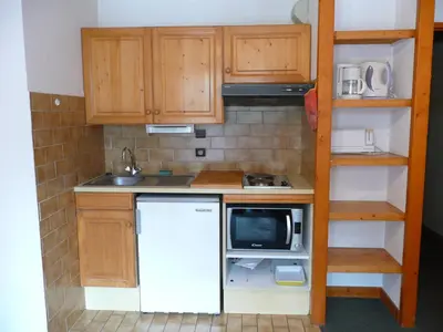 Cuisine ou kitchenette dans l'établissement Saint-Roch Piste