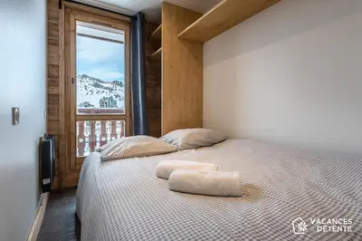 Un ou plusieurs lits dans un hébergement de l'établissement Tignes 301
