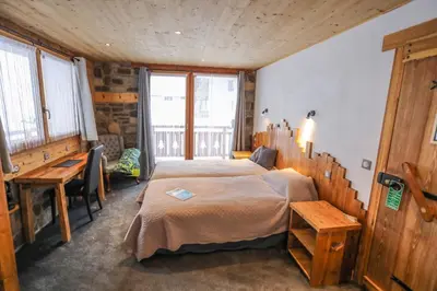 Un ou plusieurs lits dans un hébergement de l'établissement Chalet Monte Bianco