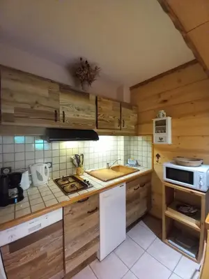 Cuisine ou kitchenette dans l'établissement Chalet Campanule