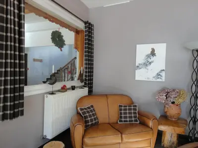 Coin salon dans l'établissement Hôtel Bellier