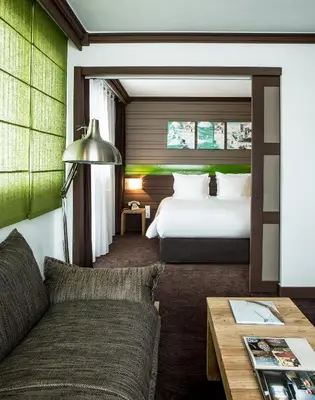 Un ou plusieurs lits dans un hébergement de l'établissement Hotel Ormelune