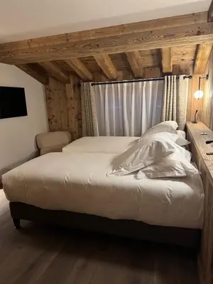 Un ou plusieurs lits dans un hébergement de l'établissement Hotel Ormelune