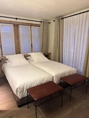 Un ou plusieurs lits dans un hébergement de l'établissement Hotel Ormelune