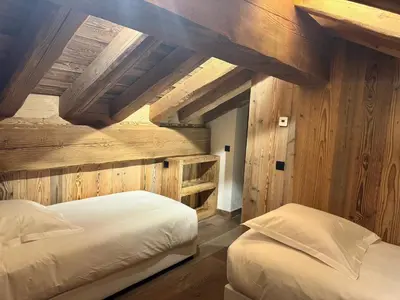 Un ou plusieurs lits dans un hébergement de l'établissement Hotel Ormelune