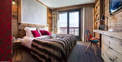Un ou plusieurs lits dans un hébergement de l'établissement Hôtel Village Montana by Les Etincelles
