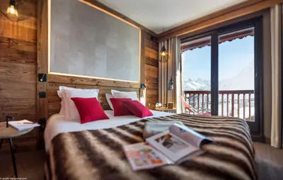 Un ou plusieurs lits dans un hébergement de l'établissement Hôtel Village Montana by Les Etincelles