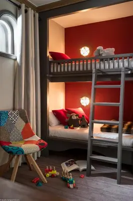 Un ou plusieurs lits dans un hébergement de l'établissement Hôtel Village Montana by Les Etincelles
