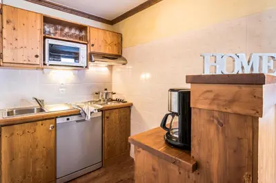Cuisine ou kitchenette dans l'établissement Résidences Village Montana by Les Etincelles