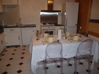 Cuisine ou kitchenette dans l'établissement Le Mazot