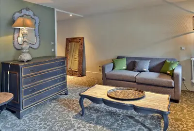 Coin salon dans l'établissement Maison de Famille Les 5 Frères